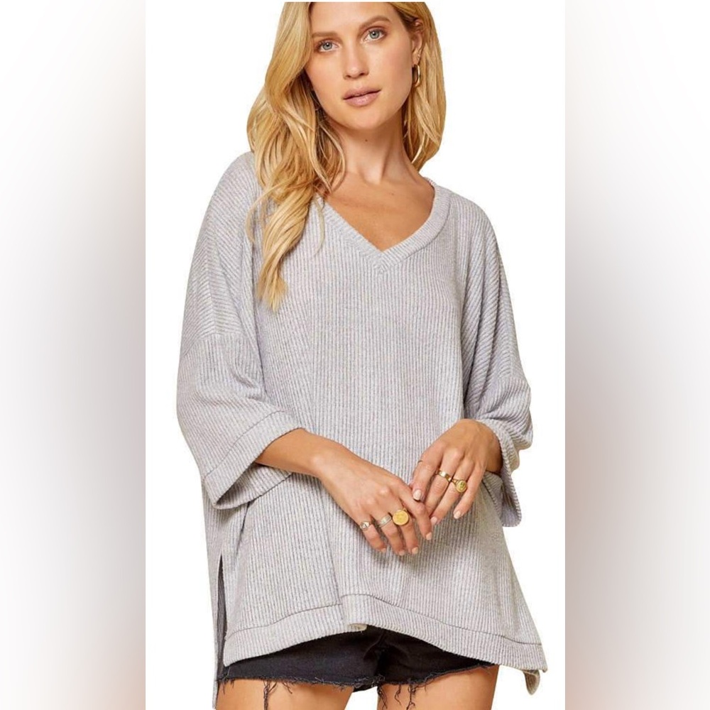 Oversized ribbed knit top.